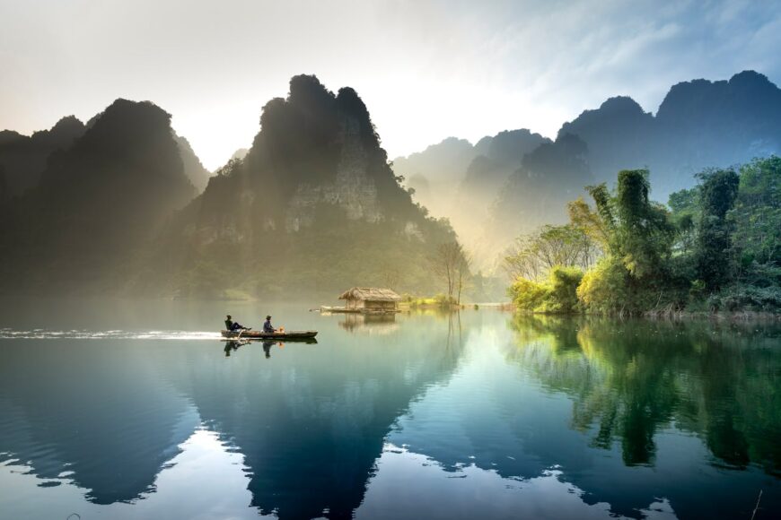 rowing-boat-on-tranquil-lake-in-nature